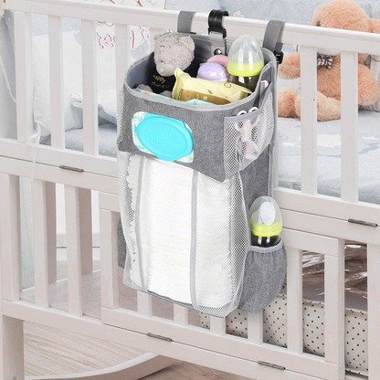 Baby cot with nappy top changer